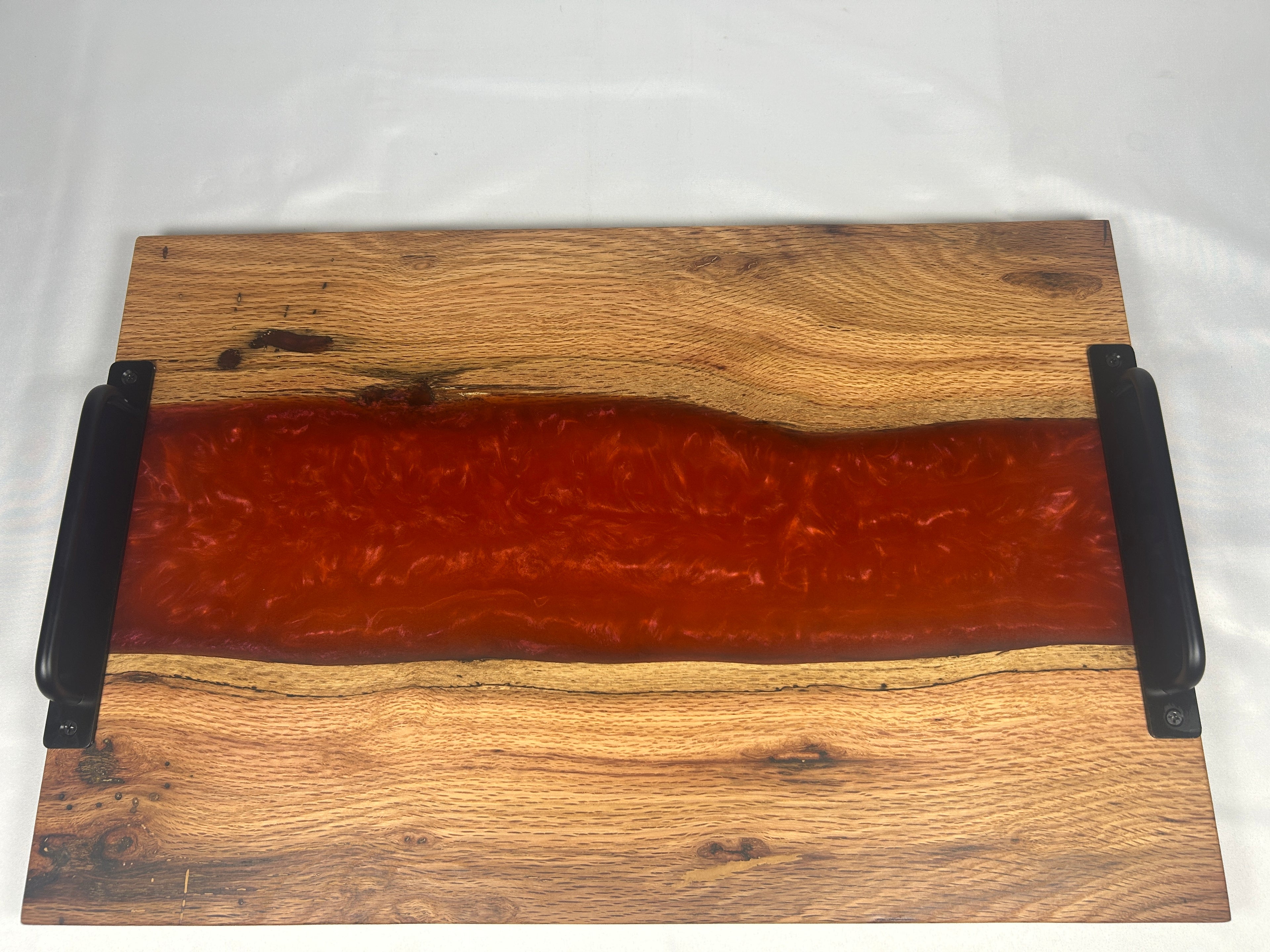 Charcuterie Board, Extra Large, Red Oak, Epoxy Live Edge River, Orange Pearl, Matte Black Handles and Metal Feet with Rubber Ring