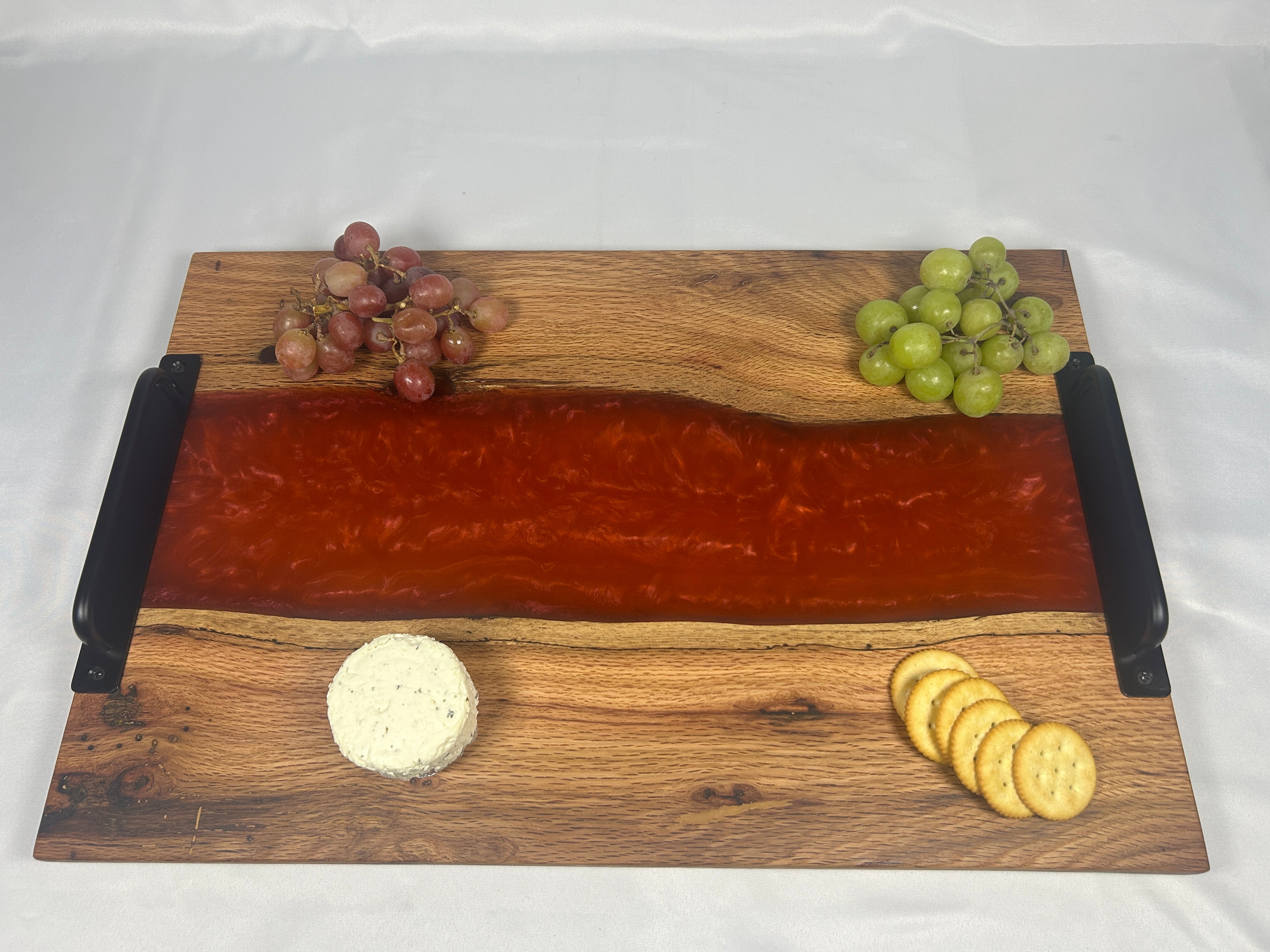 Charcuterie Board, Extra Large, Red Oak, Epoxy Live Edge River, Orange Pearl, Matte Black Handles and Metal Feet with Rubber Ring